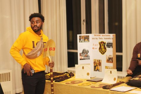 Leon Lomax, a senior digital media technology major, and member of Iota Phi Theta Fraternity, Inc., attends the Fraternity and Sorority Life fair Wednesday evening in the Grand Ballroom of Martin Luther King Jr. University Union.
