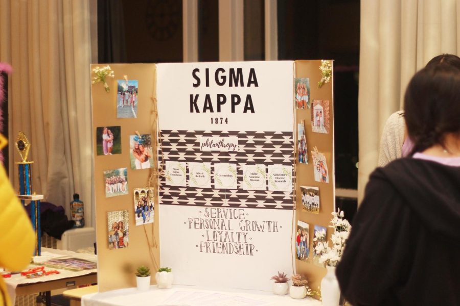Sigma Kappa Sorority presents their booth at the Fraternity Sorority Life fair Wednesday evening in the Grand Ballroom of Martin Luther King Jr. University Union.