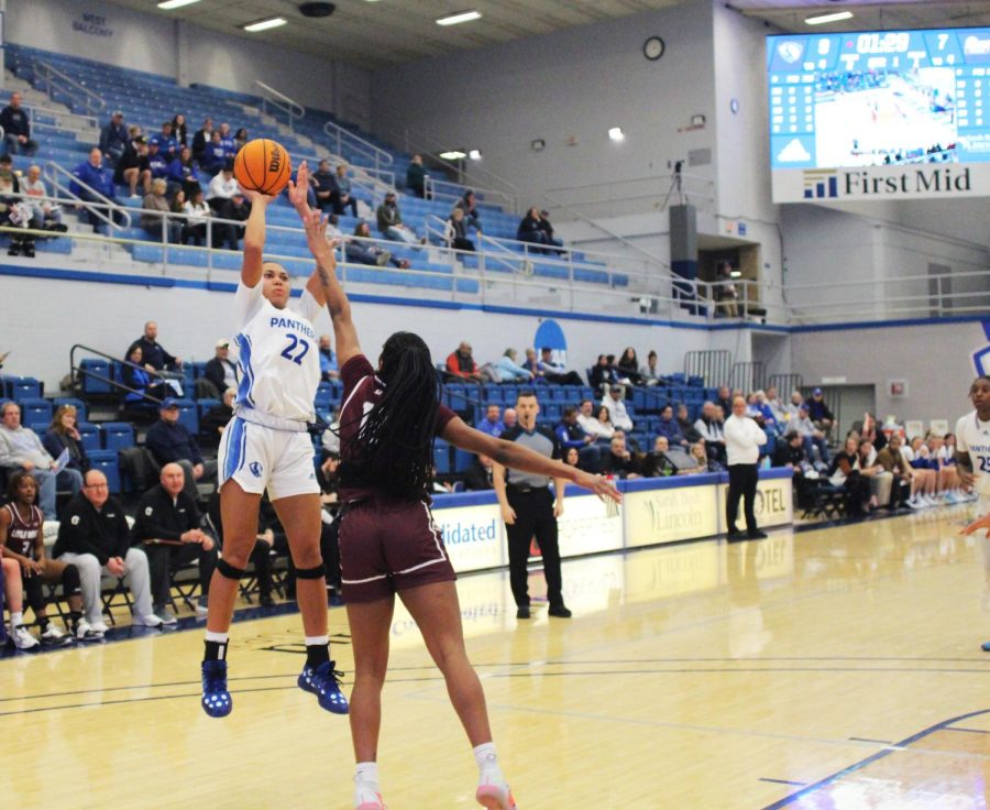Eastern guard, Lariah Washington (22), attempts a jump shot against Little Rock guard, Tia Harvey (12) in Lantz Arena on Saturday evening. The Panthers won 44-33 against the Trojans.