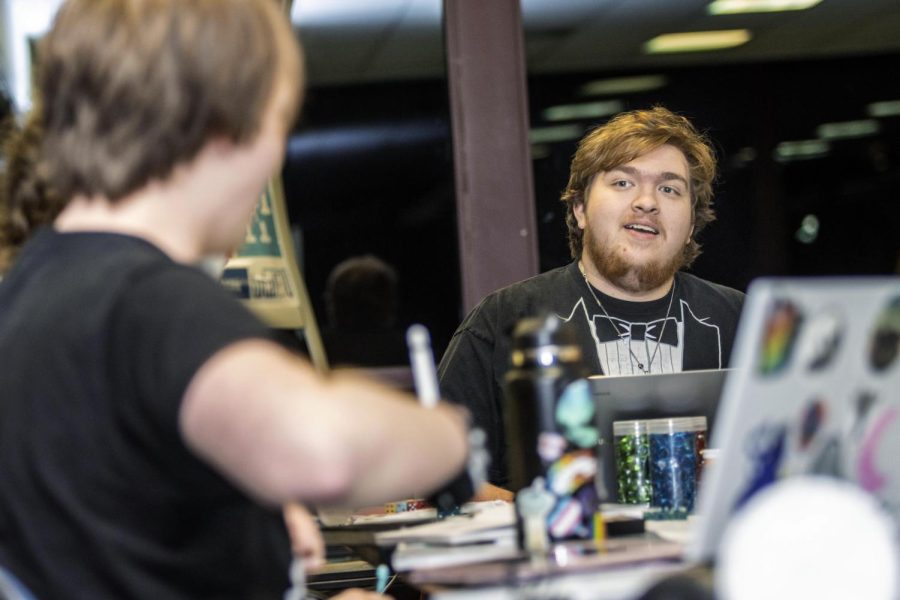 Dungeon Master Peter Grichnik, a senior chemistry major, runs a game of Generic Universal RolePlaying System (GURPS), with fellow students in the Gamers Guild registered student organization in the Bridge Lounge in the Martin Luther King Jr. University Union Sunday afternoon. 