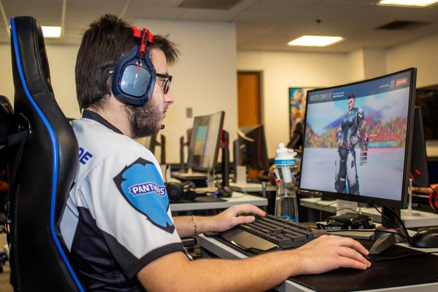 Marcello Woltmann, a senior sport management major and president of the Eastern Illinois University esports team,  finishes playing an Overwatch 2 deathmatch match Tuesday evening in the eSports Arena in the Student Recreation Center.
