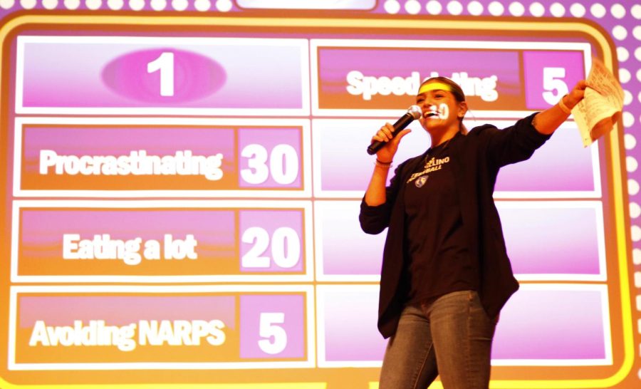 Christina Martinez Mundo, a senior public relations major, from womens volleyball hosts Family Feud as Chri-Steve Harvey with the volleyball team during Jock n Roll, Wednesday at the Grand Ballroom.