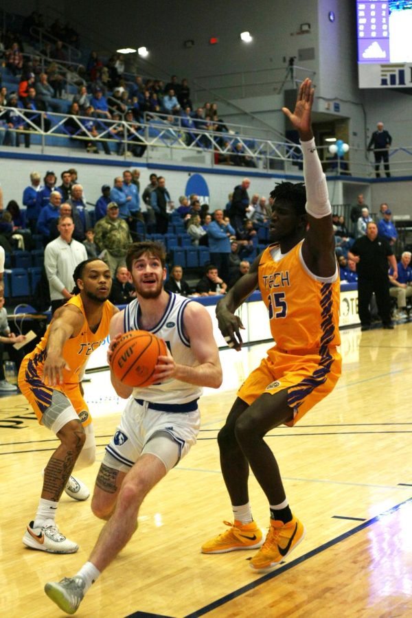 Eastern guard, Cam Haffner (3), gets ready to make a shot under the basket, after breaking a double team from Tennessee Tech players in Lantz Arena on Saturday. The Panthers lost 75-66.