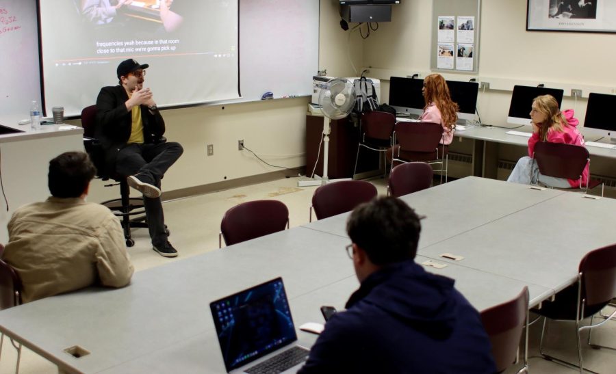 Jon Mattson, a broadcast instructor, teaches an audio class Monday morning in Buzzard Hall. Mattson and several students expressed frustrations with the lack of uniformity for Adobe software on campus.
