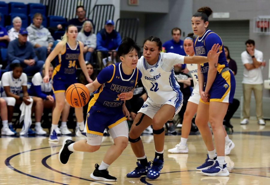 Morehead States Sandra Lin (3) is pressured by Lariah Washington (22), a senior guard, during the womens basketball game against the Morehead State Eagles at Lantz Arena Wednesday afternoon. Lin scored five points and had seven assists. Washington led the Panthers with 21 points and had three assists.  The Panthers won 60-49.