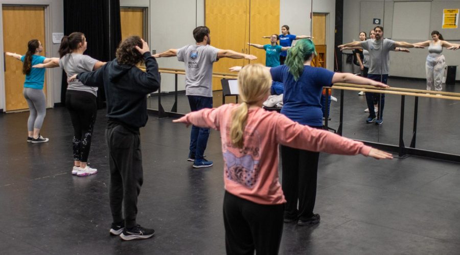 The cast warms up before rehearsal in late-January.