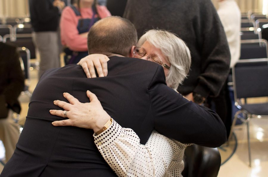 At the official announcement of Eastern Illinois Universitys 13th president, Jay Gatrell hugs his former secretary from when he began as provost in 2017 in the University Ballroom of Martin Luther King Jr. University Union Friday afternoon.