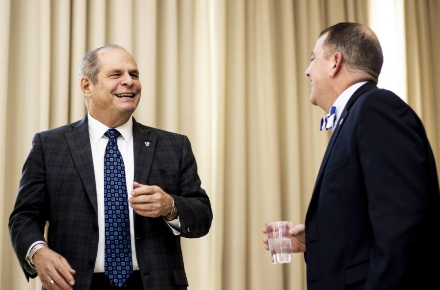 President Glassman and Jay Gatrell talk to each other at the Official Announcement and Celebration of Eastern Illinois Universitys 13th president Friday afternoon .
