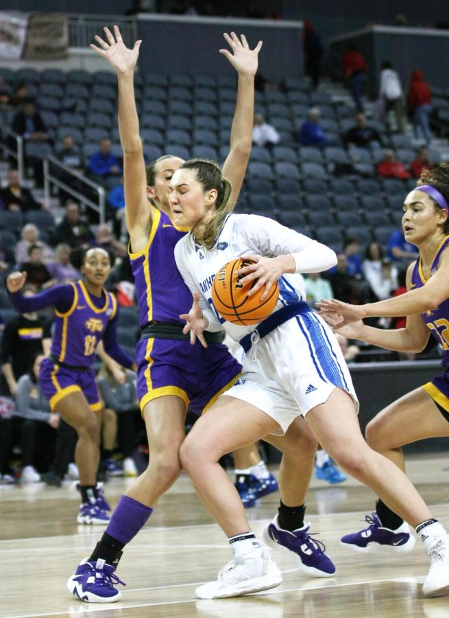 Eastern forward, Morgan Litwiller (24), uses her body to make her way to the basket in attempt to score against Tennessee Tech at the Ohio Valley Conference Tournament Friday afternoon. The Panthers lost 61-66 to the Golden Eagles. 