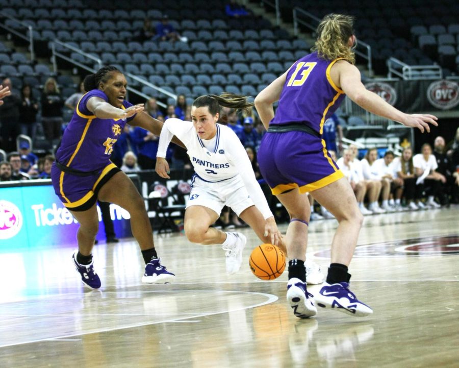 Eastern guard, Miah Monahan (3), dribbles up the paint towards the basket at the Ohio Valley Conference Tournament Friday afternoon. The Panthers lost 61-66 to the Golden Eagles.