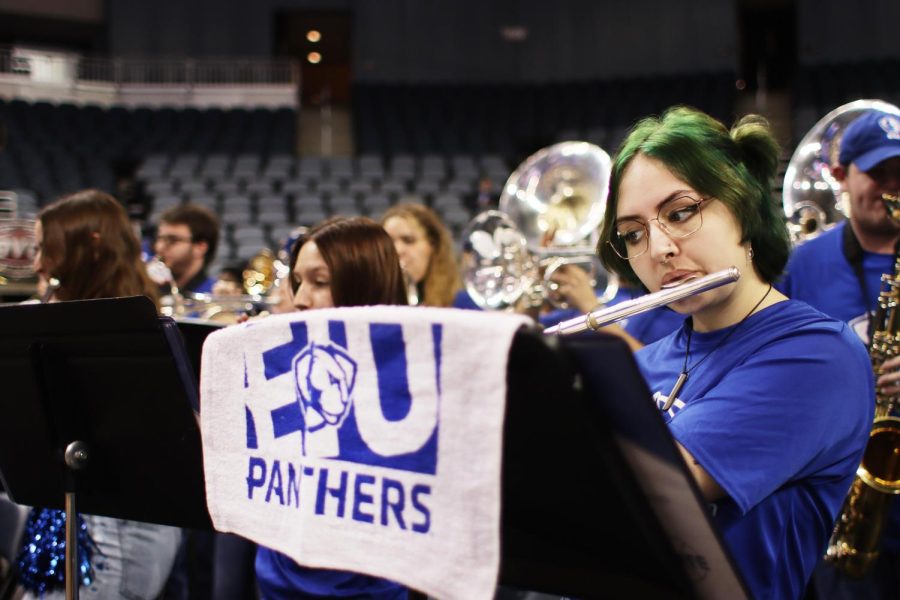 Maelee Greenwood, a sophomore music education major, plays in the Panther Marching Band at the Ohio Valley Conference for EIUs womens basketball team on Friday afternoon.