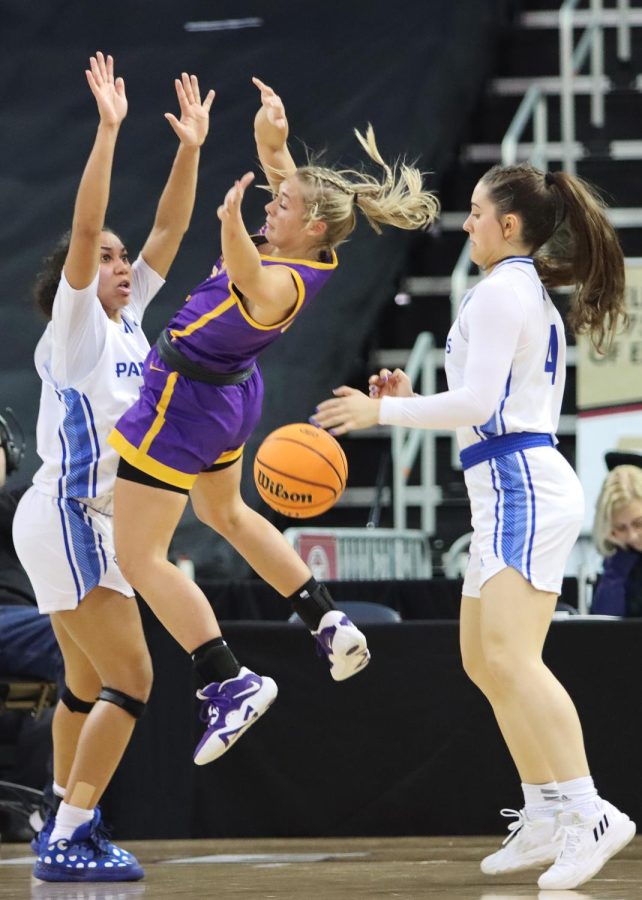Tennessee Tech player gets her shot blocked by freshman guard Lyric Johnson from behind as senior guard Lariah Washington attempts to double team her after the block and steal by Johnson at the Ohio Valley Conference Friday afternoon. The Panthers lost to the Golden Eagles 61-66.
