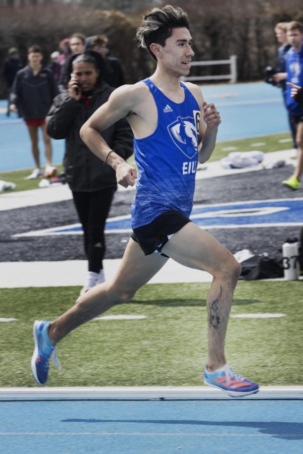 Freshman Isai Morales runs in the mens 1500 meters and places twelfth with a time of 4:04.69 at EIU Big Blue Classic on the O’Brien Field Saturday afternoon.