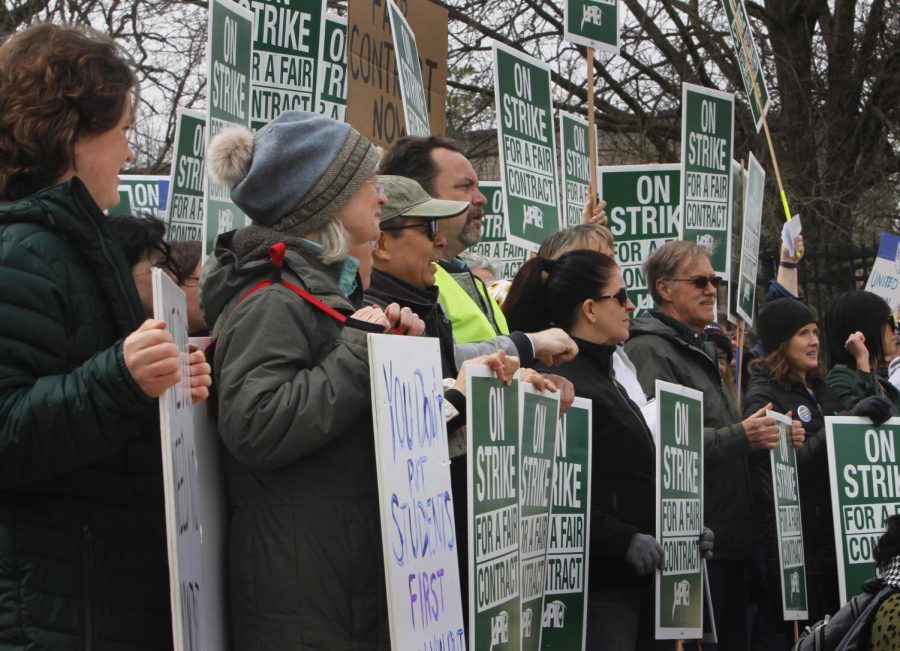 Members of EIU-UPI chant about what they want in a new contract during their strike.