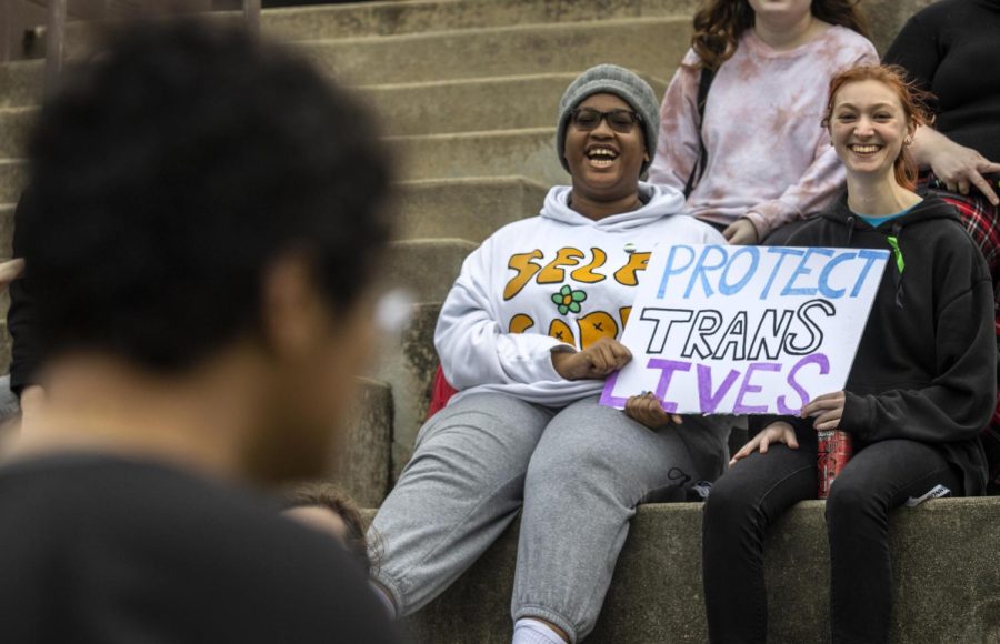 Ziggy Rolling (left), a sophomore digital media major, and Michaela Tillerson (right), a junior biological sciences major, yell chants during the protest. Both Tillerson and Rolling identify as nonbinary and chose to show up and give support because they care about the cause. 