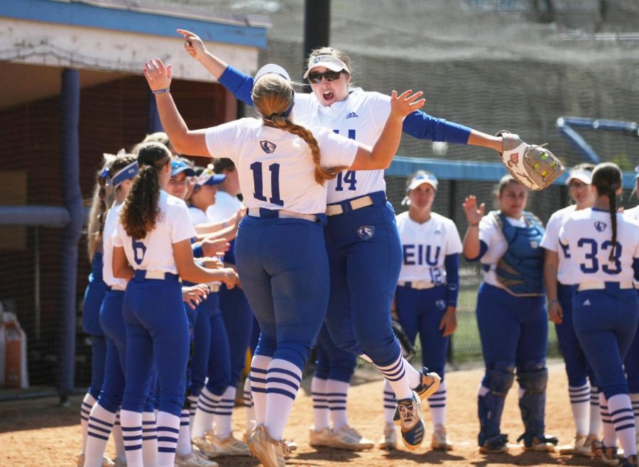 Eastern players Maddie Swart (11) and Lindy Milkowski (14) bump chests as part of their starting ritual before their game against Southern Indiana on Williams Field Saturday afternoon. The Panthers lost 2-0 to the Screaming Eagles.