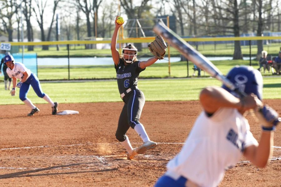 Junior pitcher Olivia Price (6), starts her pitch to St. Louis University junior infielder Jocelyn Abbott (20) on Wednesday evening.