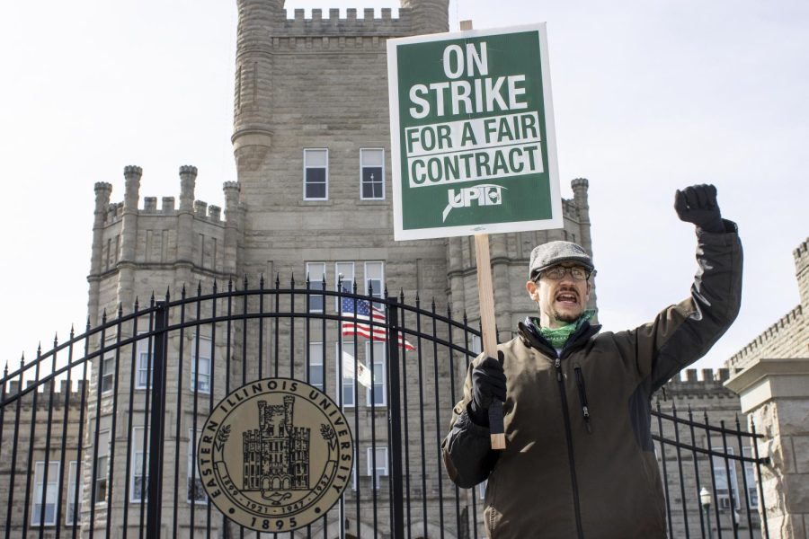 Picketers chant, Fair contract, now! in front of Old Main during the strike on Friday afternoon.