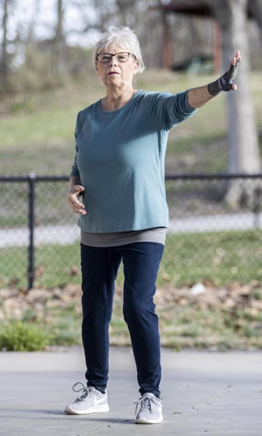 Multiple beginner to intermediate Tai chi moves are practiced at Kiwanis Park Monday afternoon.