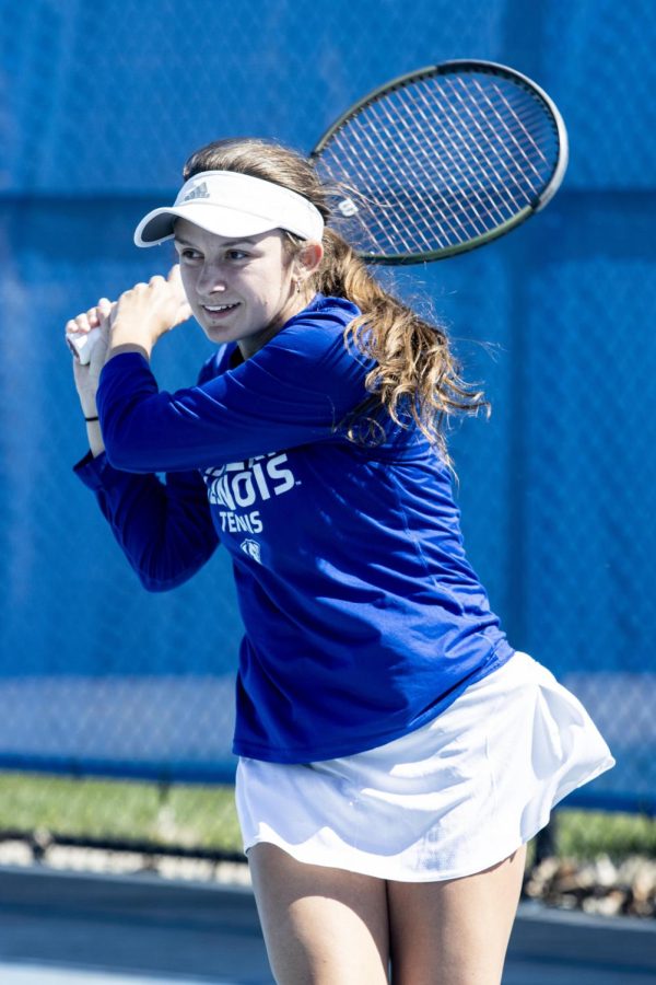 Senior Lauren Ellis gets ready to hit the ball during her singles match at their senior day game vs. Southern Illinois University Edwardsville Saturday afternoon. Ellis wins her match against Cougar player Fabiola Perez. The Panthers lose overall 5-2 to the Cougars.