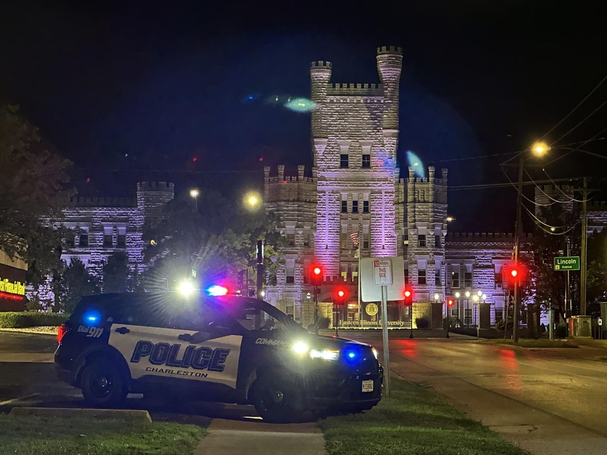 A Charleston squad car parked in the area of the shots fired call after a suspect had been placed into custody at Eastern Illinois University on Aug. 27.