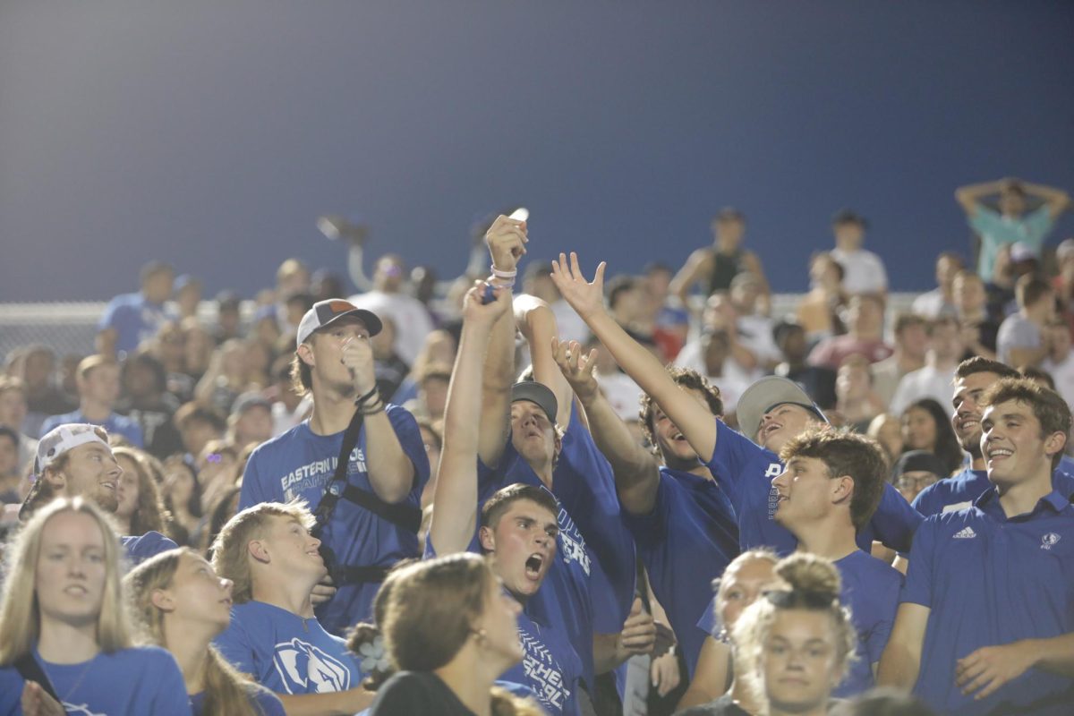 At First night the crowed tries to catch toy footballs and bracelets thrown by Eastern illinois Football team Sunday Night