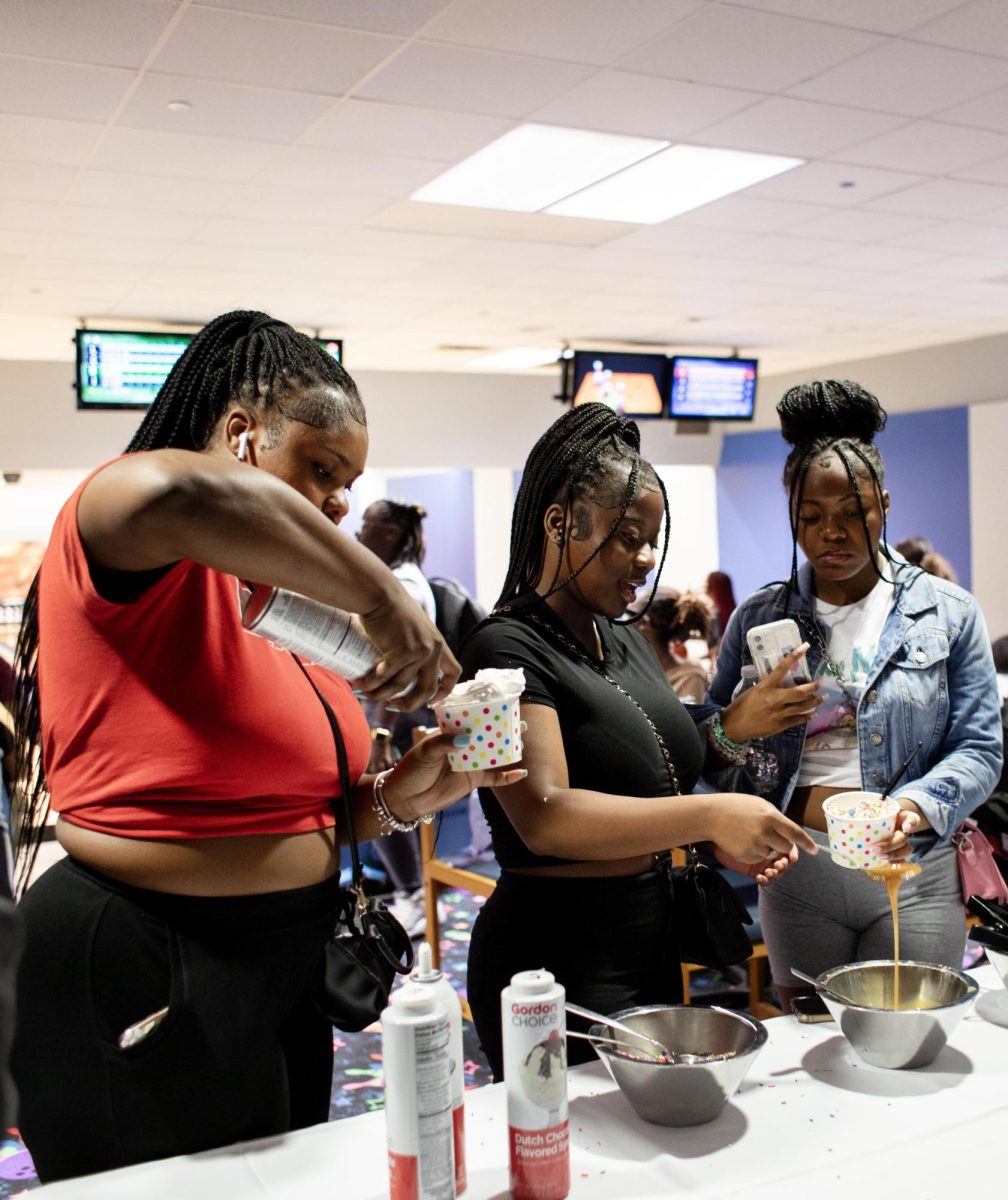 EIUs Black Student Union hosts Whats the Scoop?, a free ice cream and bowling social in the bowling alley of Martin Luther King Jr. University Union Monday night