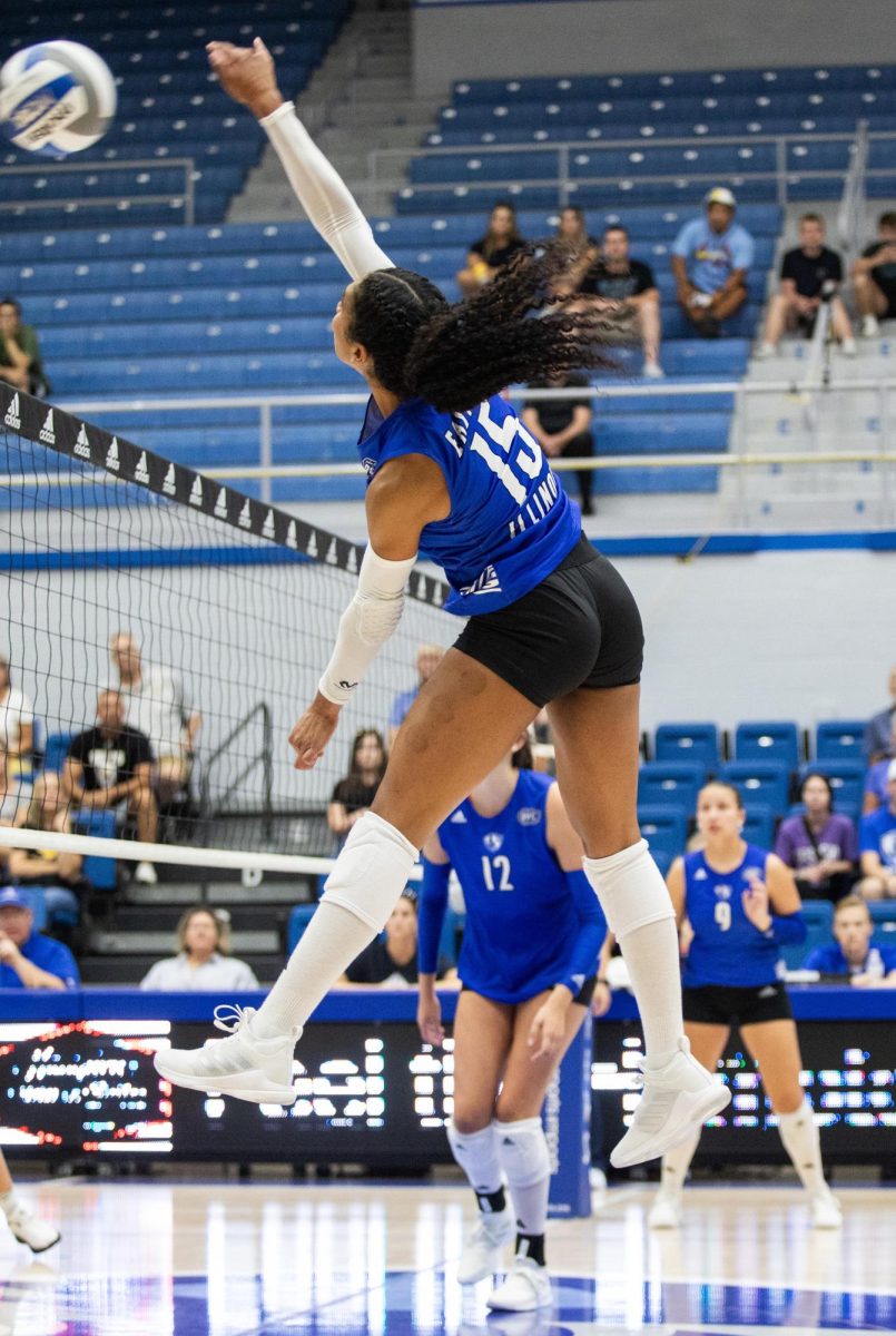 Senior outside hitter Giovana Larregui Lopez hits the ball over the net for the Panthers against their game vs. Valparaiso. The Panthers won 3-2 against the Beacons Friday night in Lantz Arena.