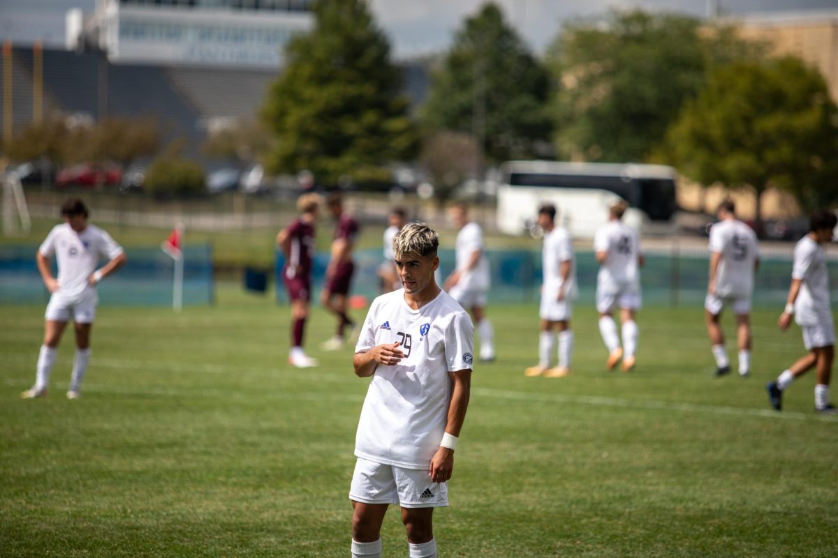 Adrian Lechuga, a sophomore digital media technology major, watches as a player from Bellarmine gets substituted onto the field at Lakeside Field Saturday afternoon