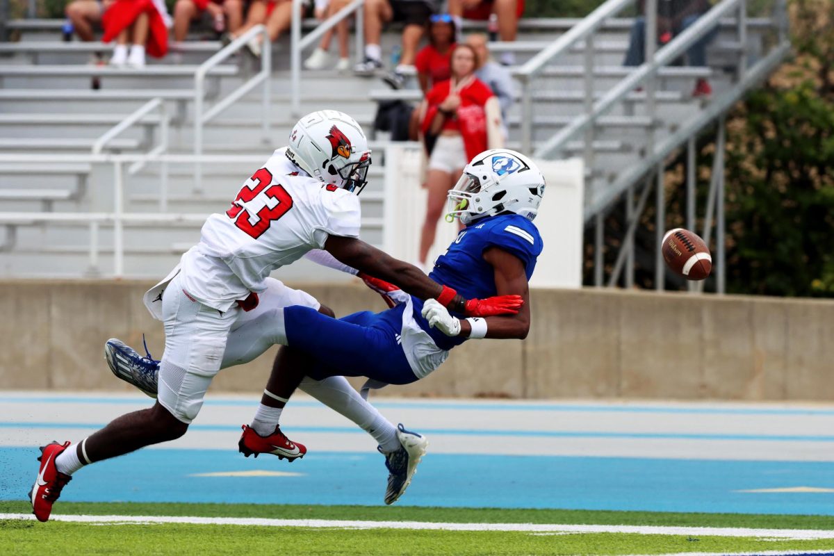 Sophomore wide receiver Justin Bowick Jr. attempts for a catch but is interrupted by Illinois State Universitys Paul Omodia, a freshman defensive back during the Mid-America Classic game against the Redbirds at OBrien Field Saturday. The Panthers won 14-13. 