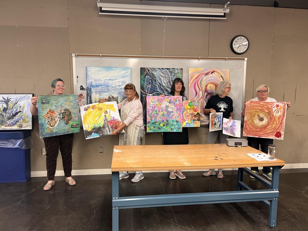 Participants at Easterms Spontaneous Intuitive Painting on Thursday, Sept. 7, 2023 in Doudna Fine Arts Center at Eastern Illinois University. 