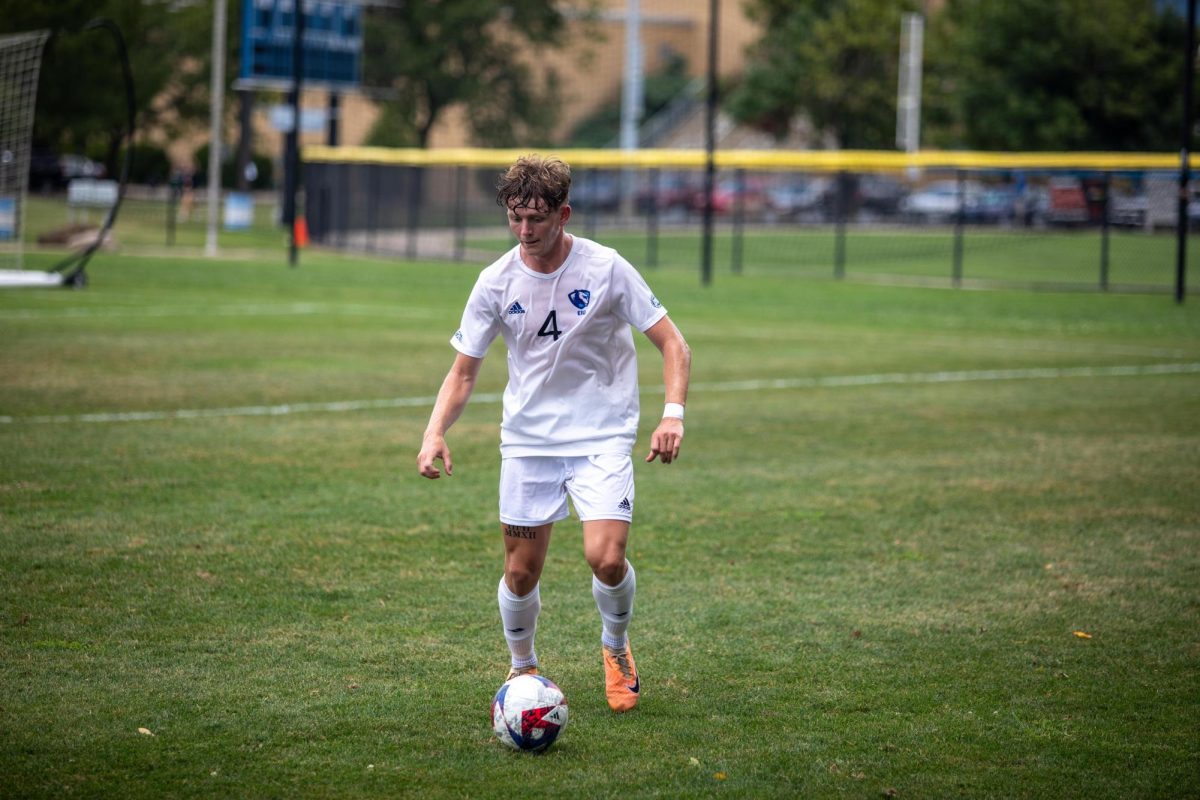 Lance Somerfield, a freshman, dribbles the ball up field against Bellarmine at Lakeside Field Saturday afternoon