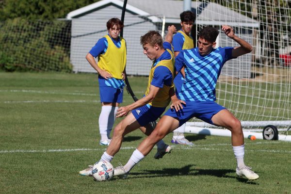 Forward Jeffery Rinker II (11) and midfielder Felipe Kerr Lourenco (6) at mens soccer practice Lakeside Field on Thursday.