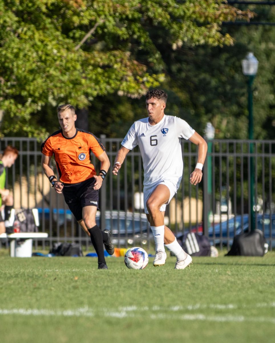 Senior Midfielder Felipe Kerr Lourenco dribbles the ball upfield at Eastern Illinois University Lakeside Field Thursday afternoon.  Felipe Kerr Lourenco (6) assisted Ashur Eshw (2) which led to the panthers beating Lindenwood 2-1.