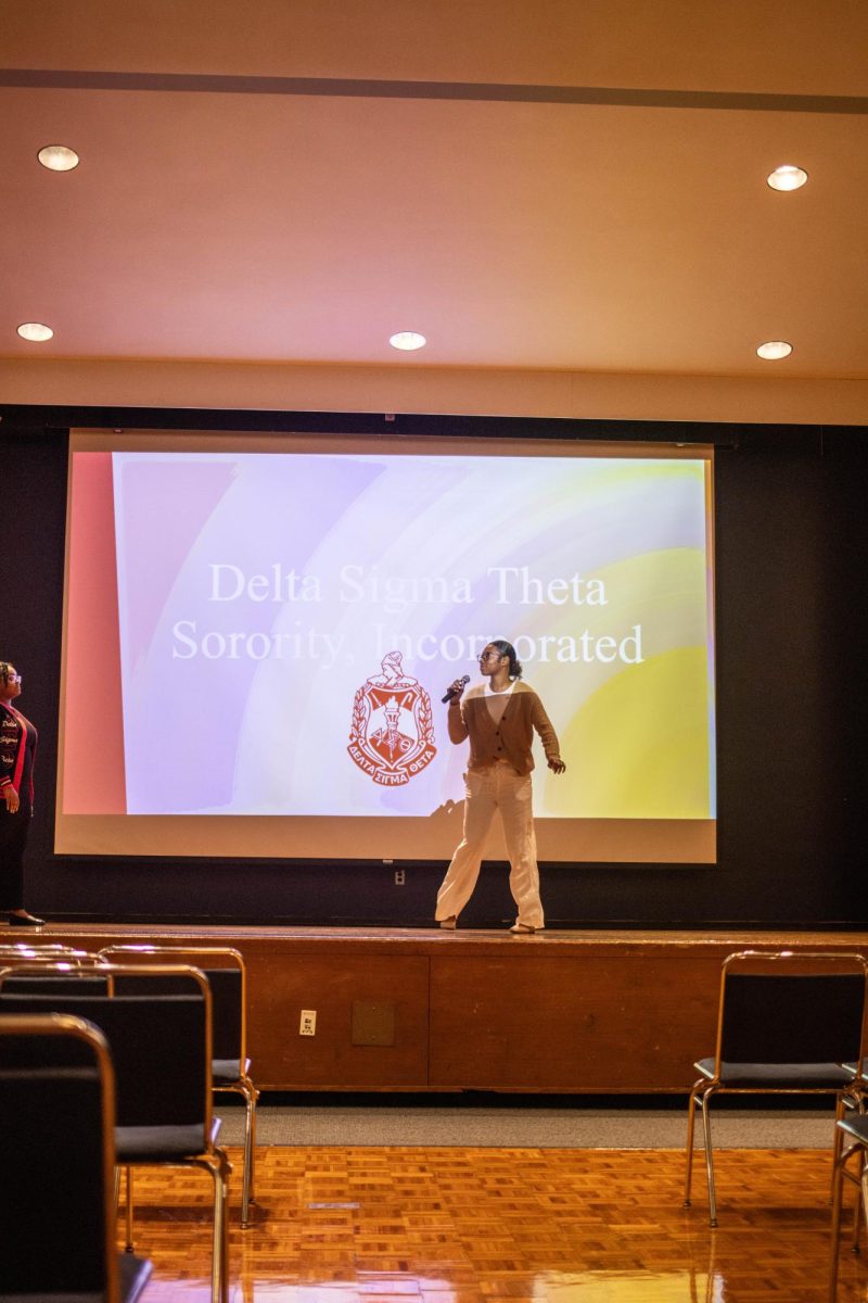 A Delta Sigma Theta Sorority Incorporated member, speaks at the NPHC Greek 101 event at Martin Luther King Jr. University Union on Eastern Illinois University campus Wednesday Evening