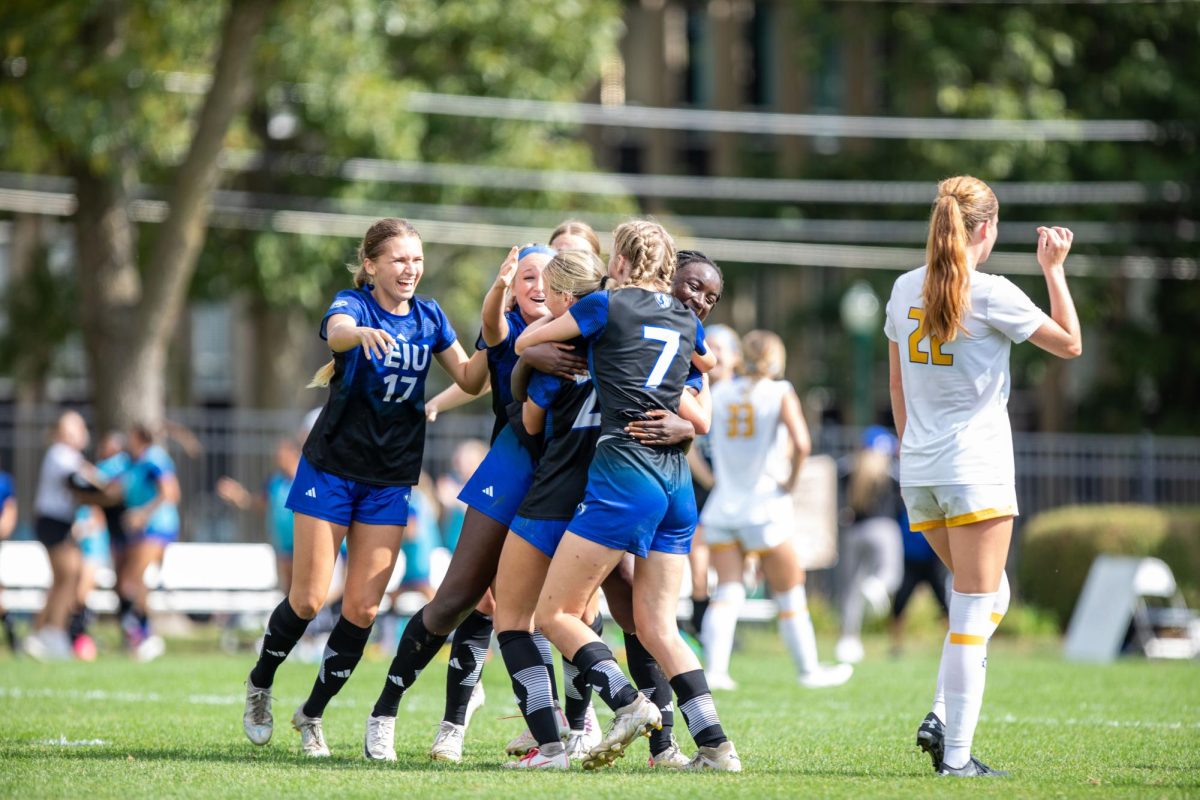 Ella Onstott, Sophomore Midfielder, (20) celebrates with her team after scoring the game tying goal against MoreHead St. Eagles at Eastern Illinois University Lakeside Field Thursday afternoon.