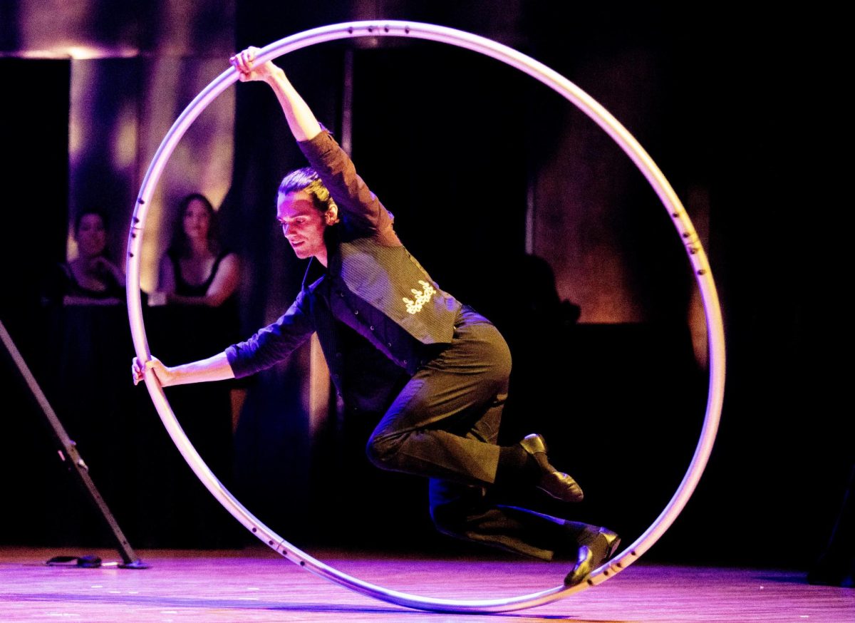 Circus and movement artist Alex Oliva performs with the Cyr wheel as a apart of the Cirque Night Out show.