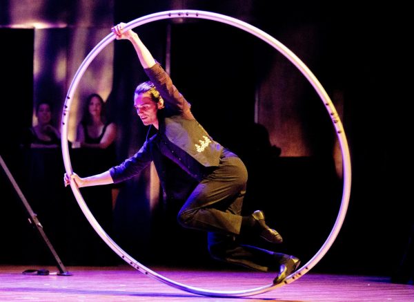 Circus and movement artist Alex Oliva performs with the Cyr wheel as a apart of the Cirque Night Out show.