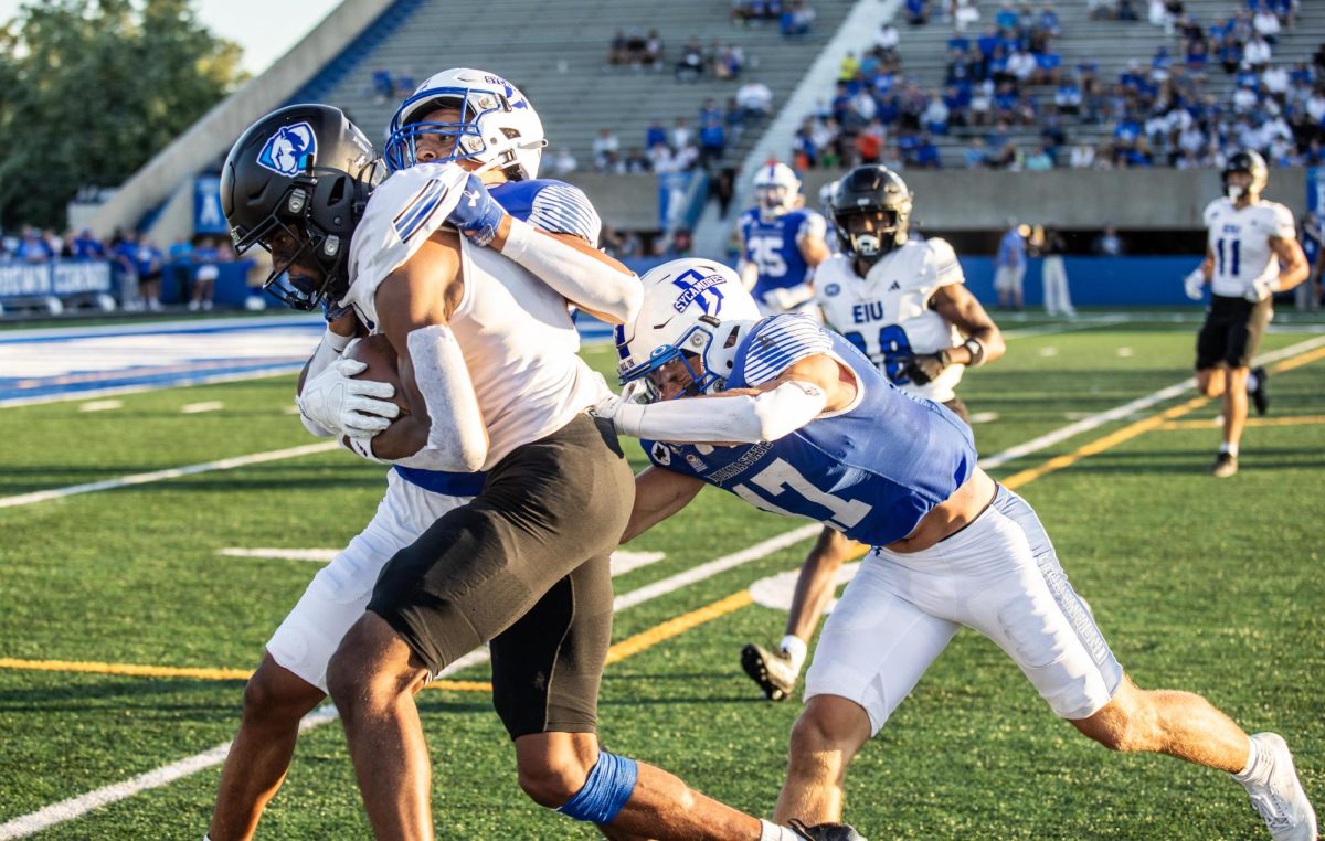 Wide receiver Justin Bowick Jr. (1) gets pushed by Indiana State players while attempting to score a touchdown. The Panthers won 27-0 against the Sycamores Thursday night. 