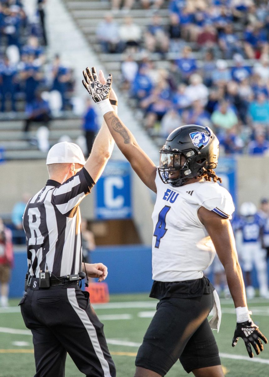 Safety Blake Ruffin (4) throws up his hand in excitement after successfully tackling a Sycamore player. The Panthers won 27-0 against the Sycamores Thursday night. 