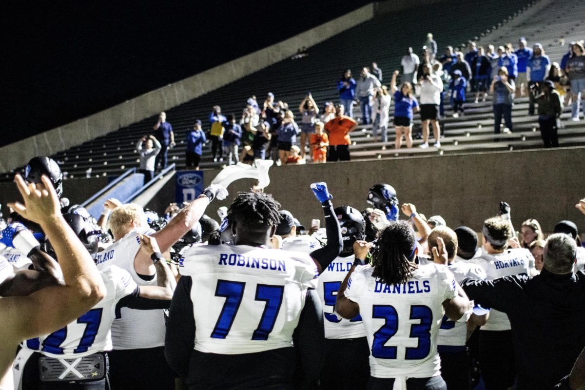 EIUs football team celebrate their first win of the season with the EIU section at Indiana States memorial stadium. The Panthers won 27-0 against the Sycamores Thursday night. 