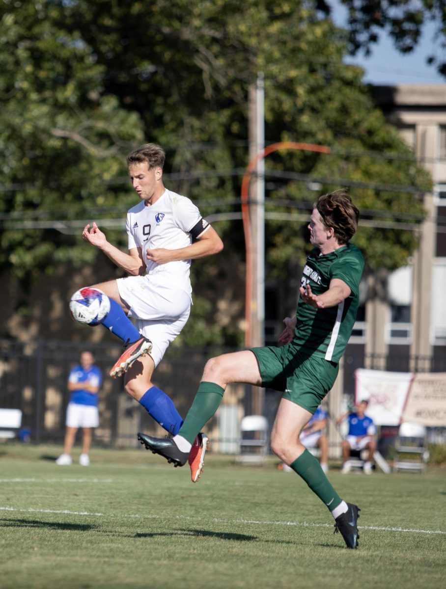 Sophomore Forward Casey Welage tries to steal the soccerball from Lindenwood Lions defender at Lakeside Field Thursday afternoon.