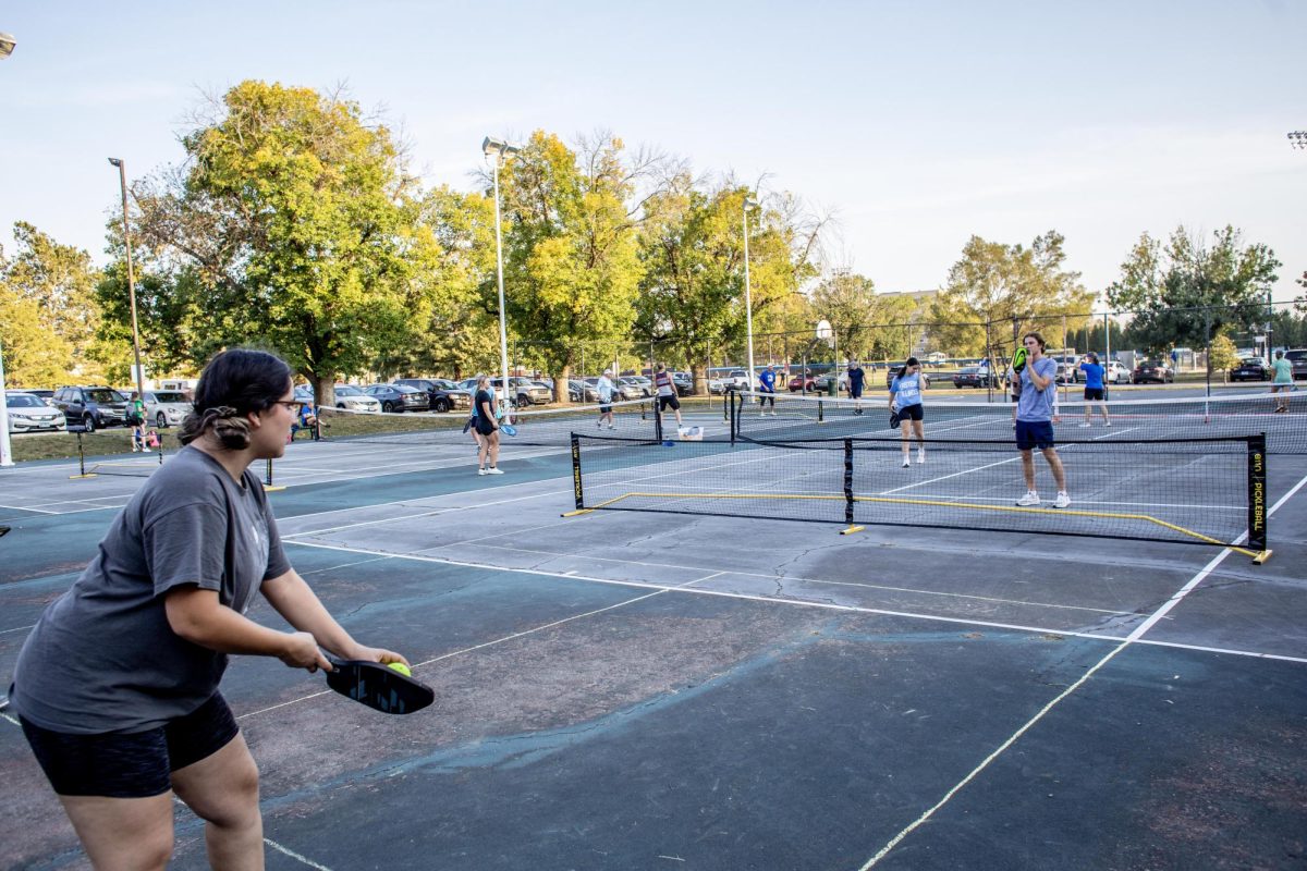Jessica Nantes, a senior TV and video production major plays pickleball with her sister and friends and at the outside Lantz Arena tennis courts Tuesday evening.