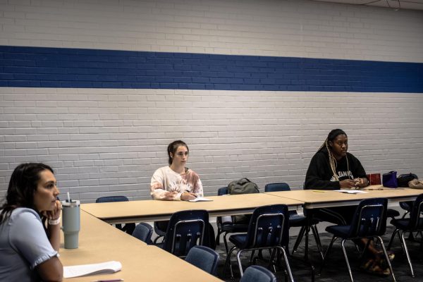 During Safe Zone Training, students went through packets on how to provide a safe place for the LGBTQ community in Martin Luther King Jr. University Union Thursday afternoon.