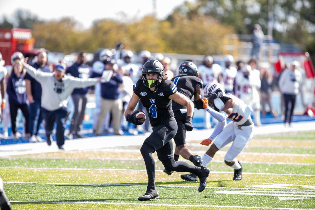 Justin Thomas, a graduate wide receiver, runs the ball pass UT Martin players during their homecoming game at O‘Brien Field Saturday afternoon.