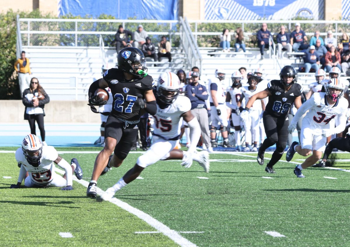 Zay Gentry, a junior defensive back (27), Runs the football back during kickoff return during Eastern Illinois University  Homecoming football game Saturday afternoon.