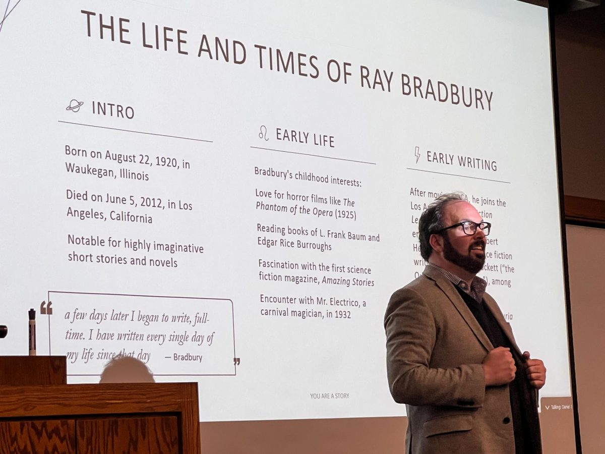 Dr. Aaron Lawler, a assistant professor from Waubonsee Community College gives a presentation at the You Are A Story event, held through the Academy of Lifelong Learning at Lumpkin College of Business and Technology Tuesday afternoon.