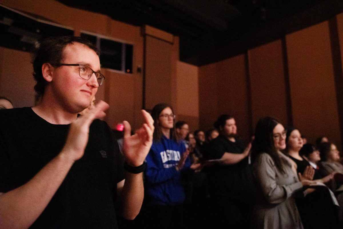 Fans in attendance give a standing ovation for Abilene after their last song of the night in Doudna Fine Arts Center.
