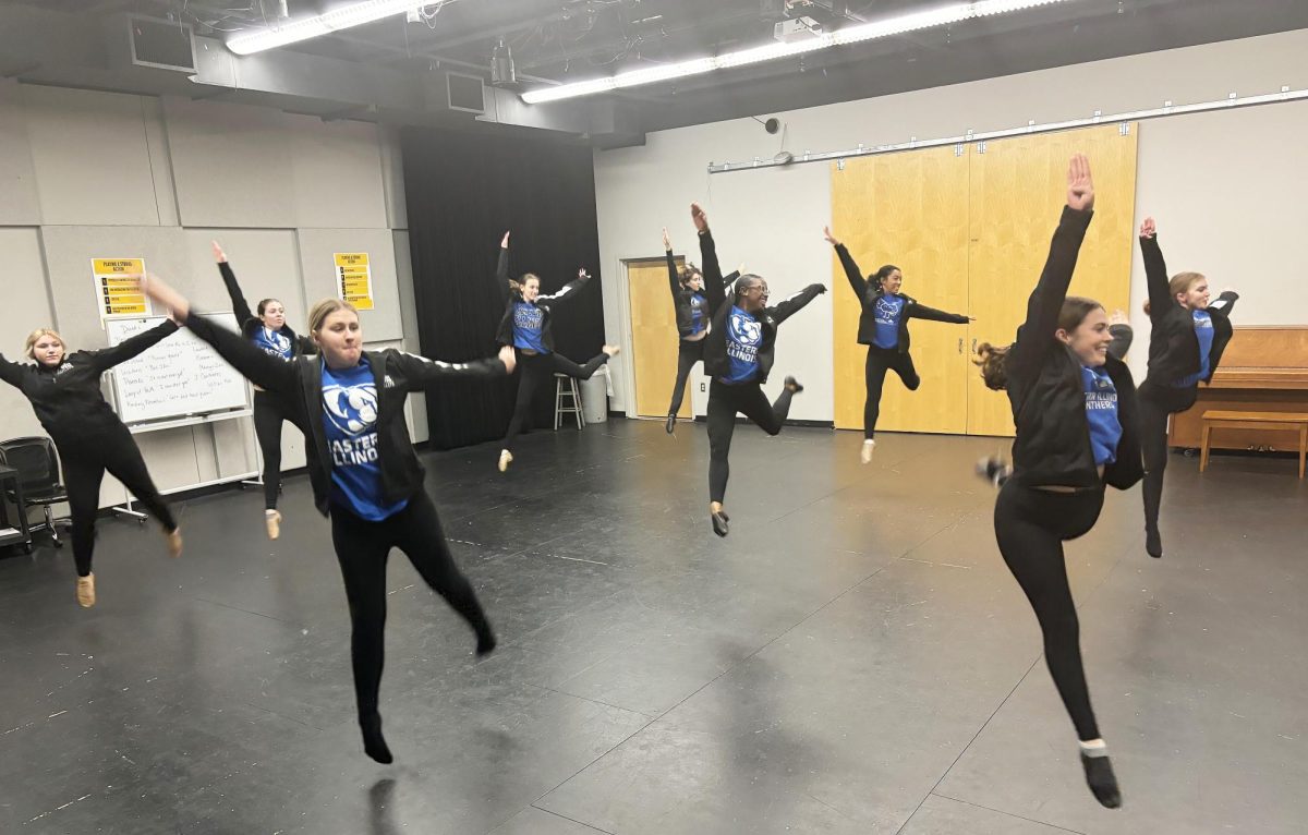 The Eastern Illinois University Dancers practice a routine in the Globe Theatre of Doudna Fine Arts Center Tuesday night.