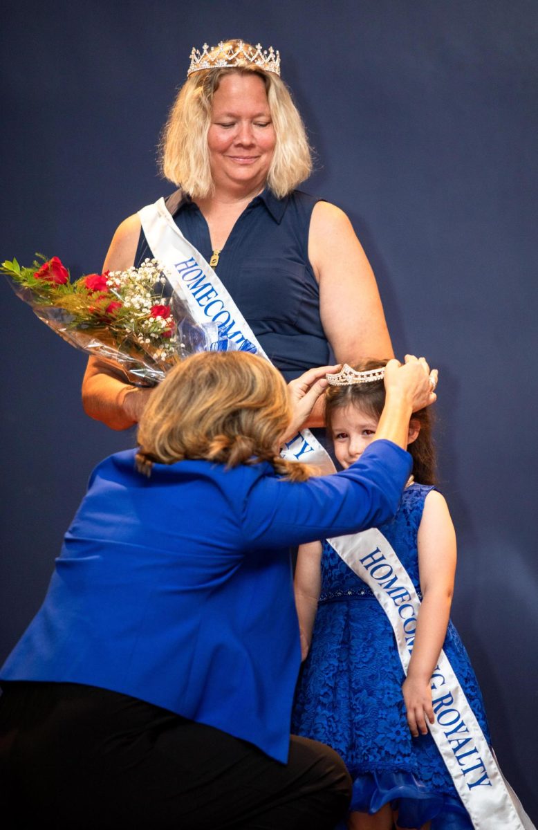 The Little Princess of the 2023 EIU Homecoming Royalty Court gets crowned by Dr. Anne Flaherty, Vice President for Student Affairs Monday night.